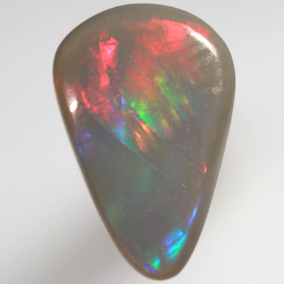 SOLID BLACK OPAL Broad rolling flash of cherry red fire